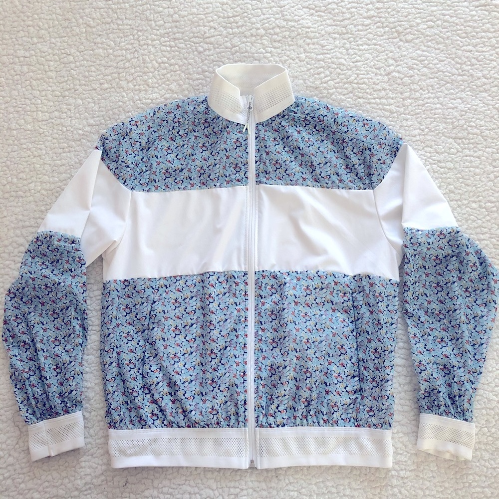 ASICS Sport Windbreaker in White & Blue Floral